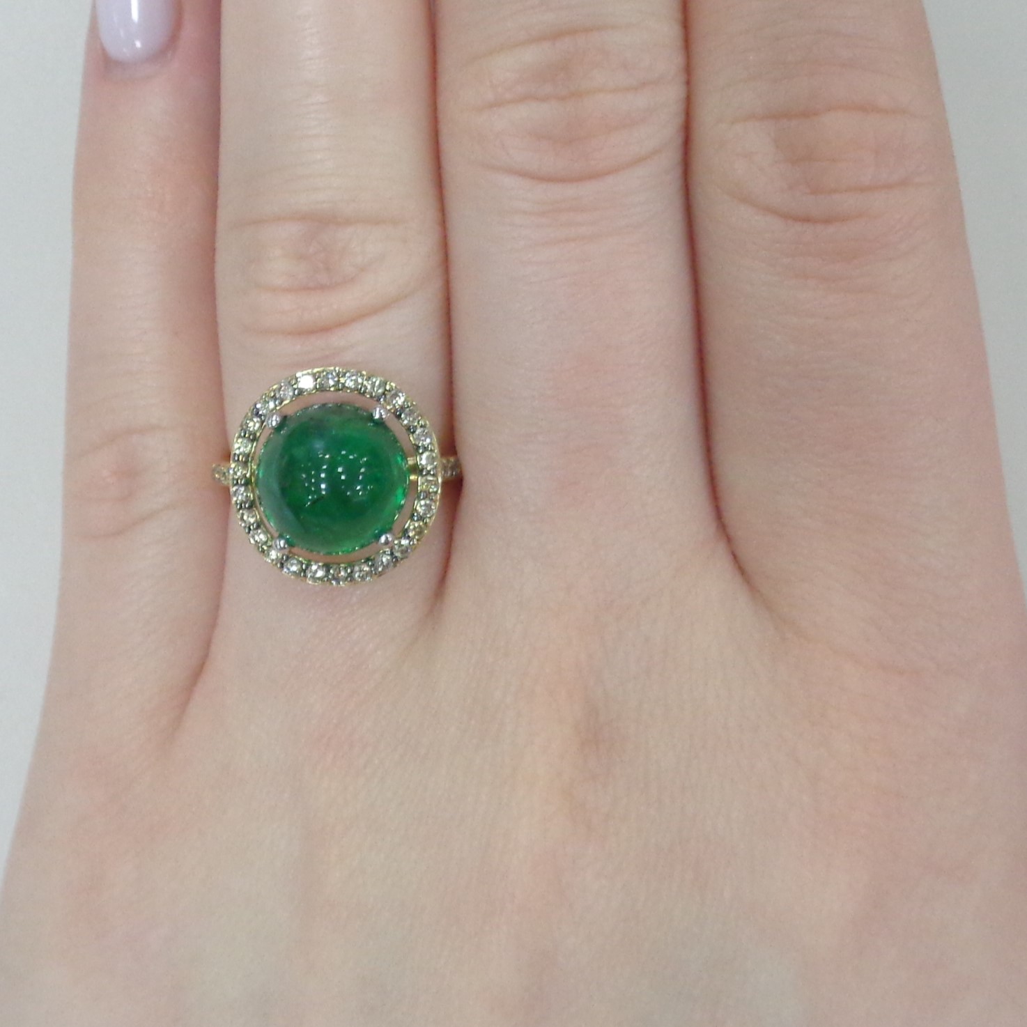 Кольцо из желтого золота с изумрудом